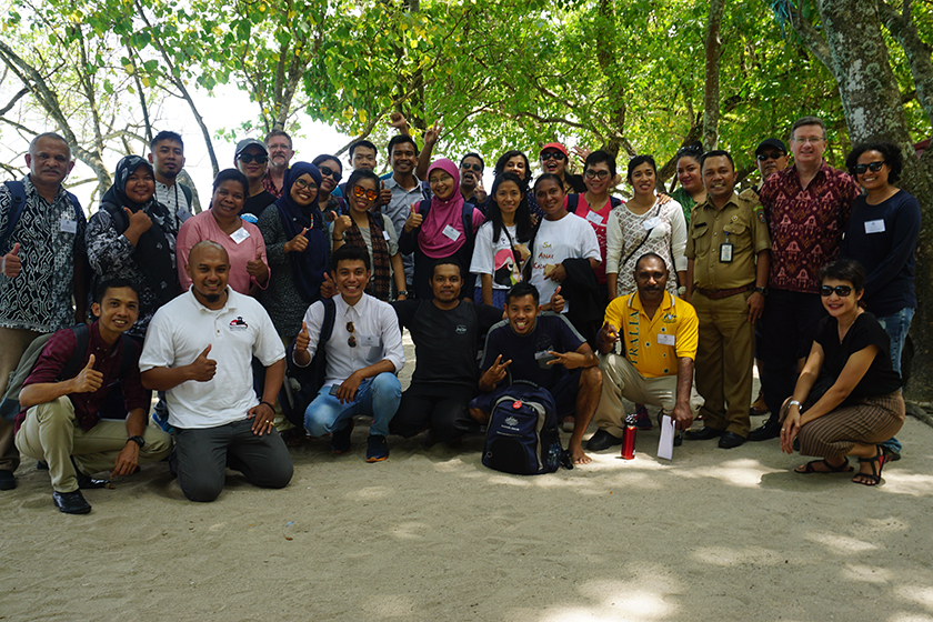 A group of people smiling